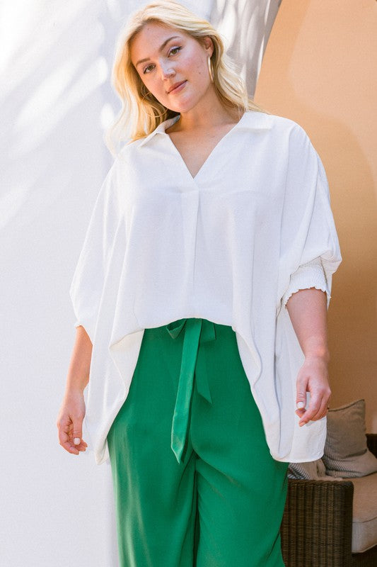 Oversized white flowly top